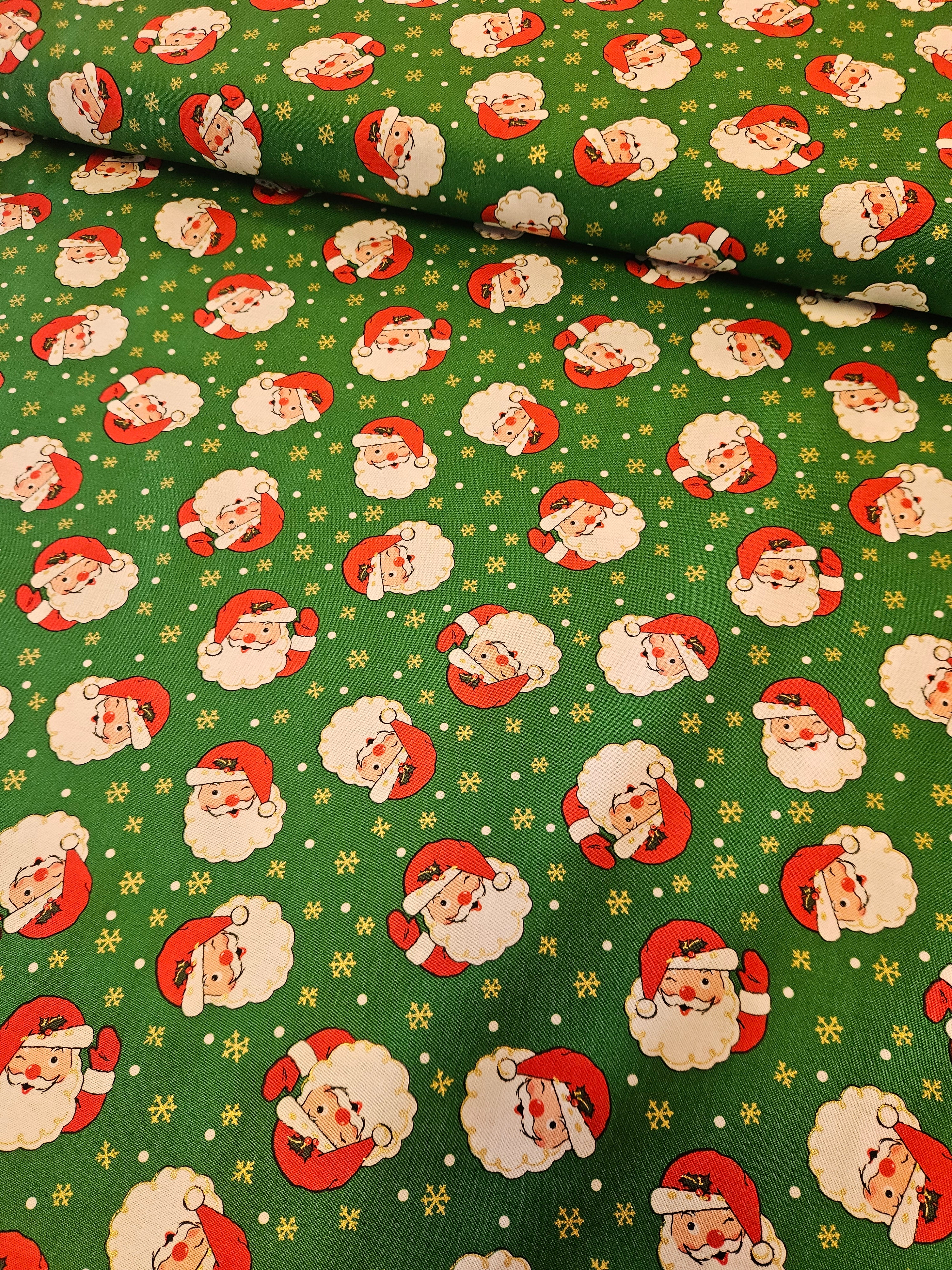 Vintage Holidays Quiltstof – Winking Santas Groen