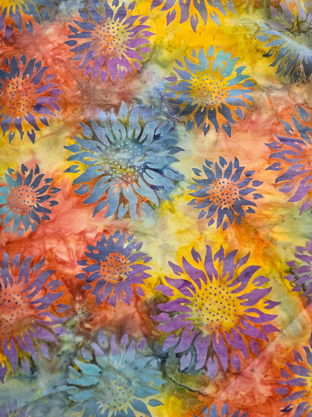 Zonnebloemen Batik Quiltstof – Paars, Blauw en Oranje