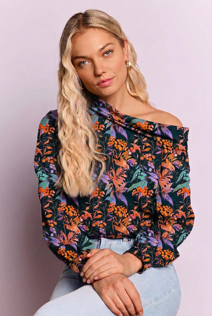 Top met fellere oranje, paarse en turquoise kleuren
